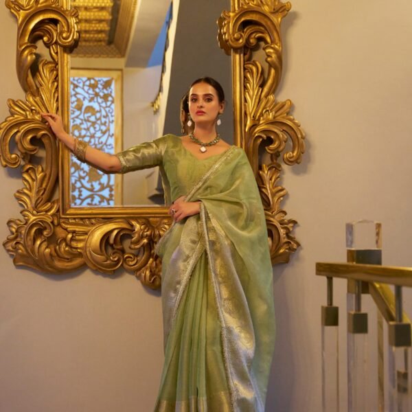 Bewitching Pista Green Zari Weaving Tissue Silk Saree With Blouse